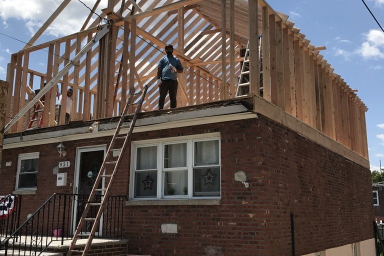 Wood-framed second-story home addition under construction in NYC